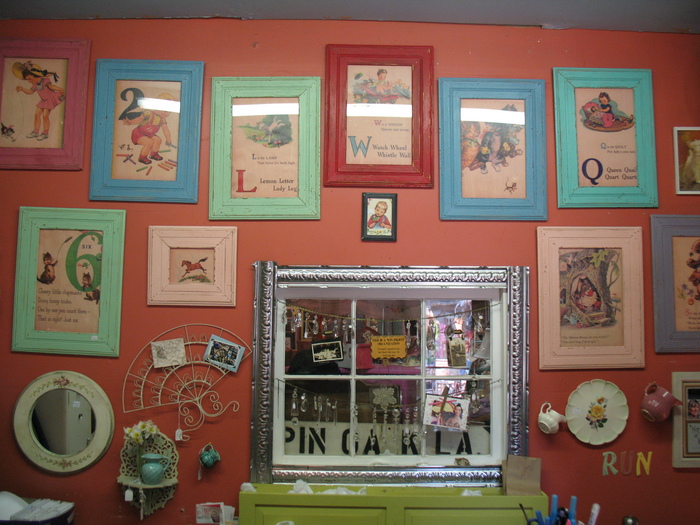 Just a few of the vintage prints framed in beadboard